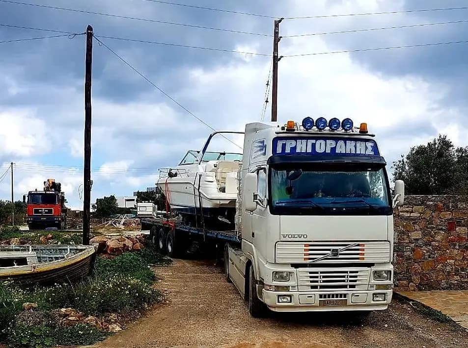 Truck transporting a boat